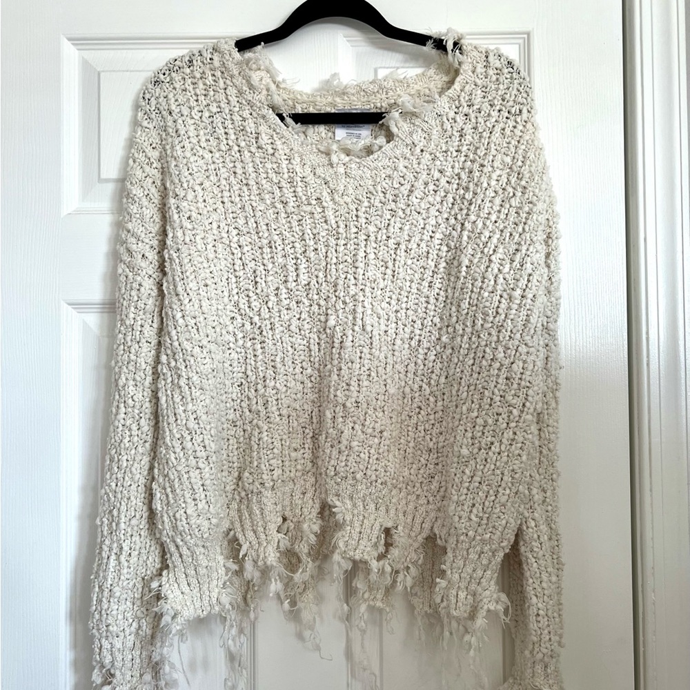 cream sweater